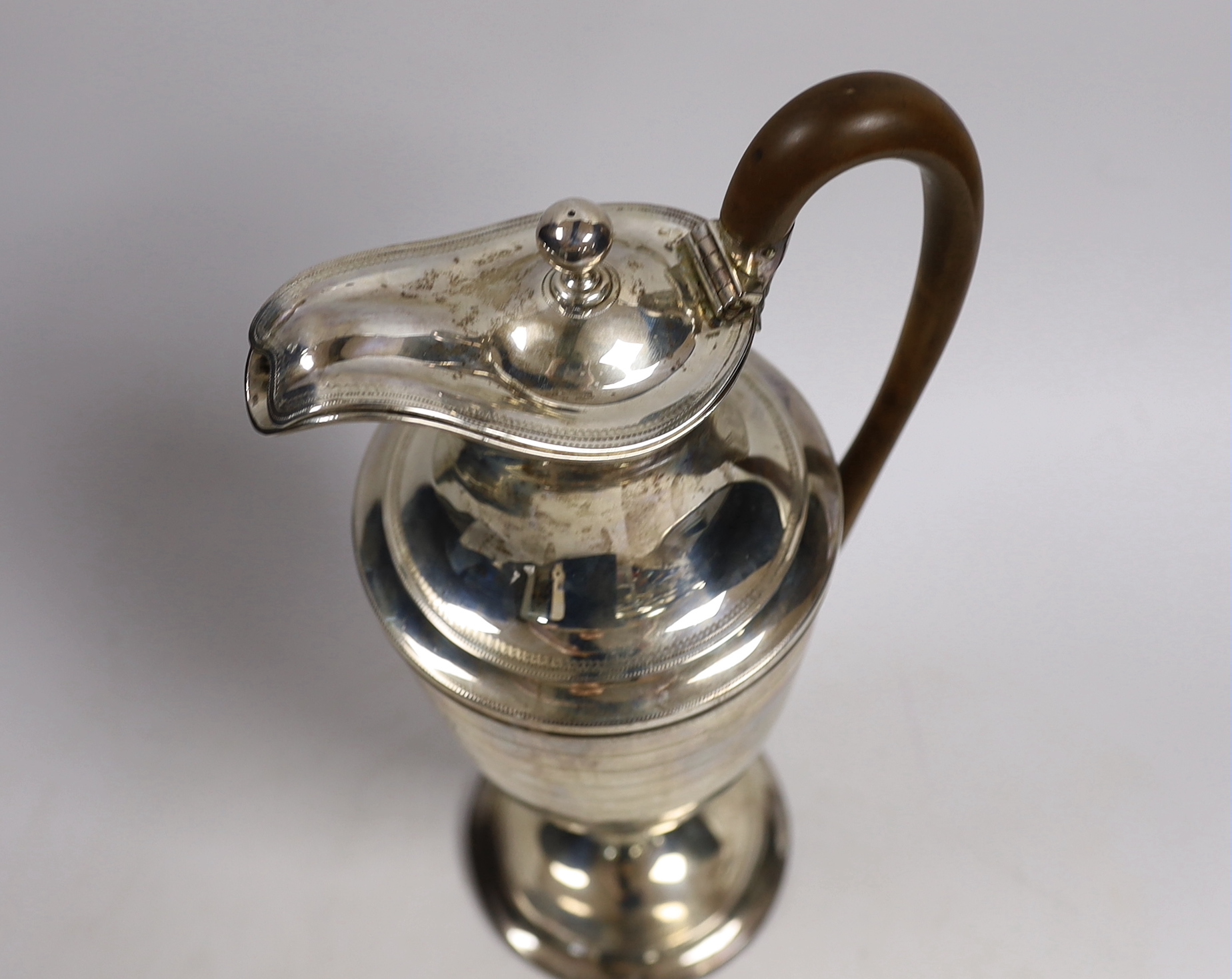 A George III silver hot water pot, London, 1792, by Henry Chawner, height 30.3cm, gross weight 12.8oz.